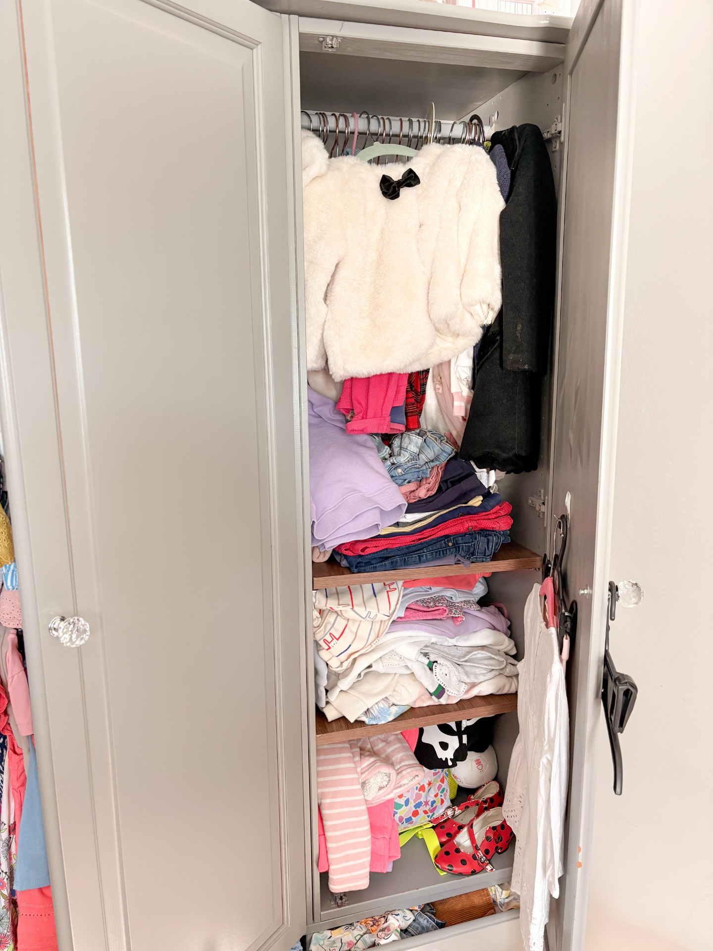 Child's wardrobe, sorted and simplified. before